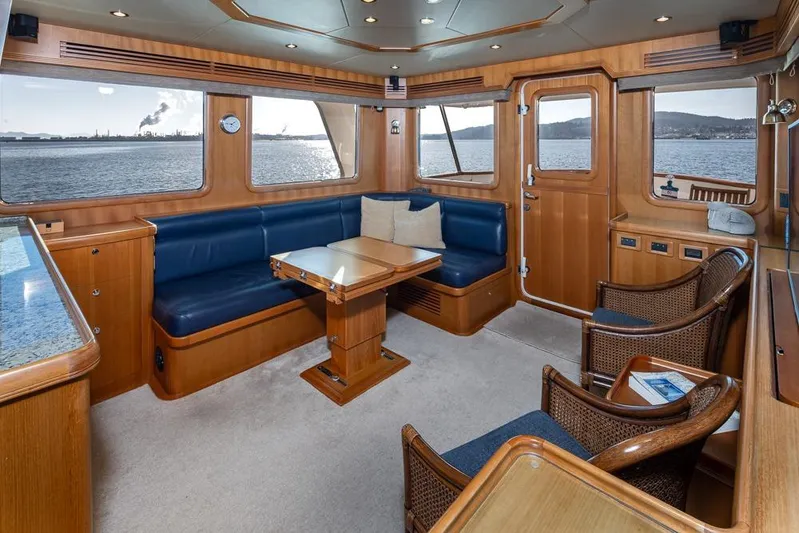 Raindancer Yacht Photos Pics Luxurious interior of 2009 Selene 60 Ocean Trawler with ocean view and elegant seating.
