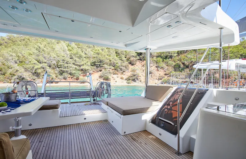  Yacht Photos Pics Luxurious Lagoon 52 F yacht interior, 2014 model, with spacious seating and scenic water view.