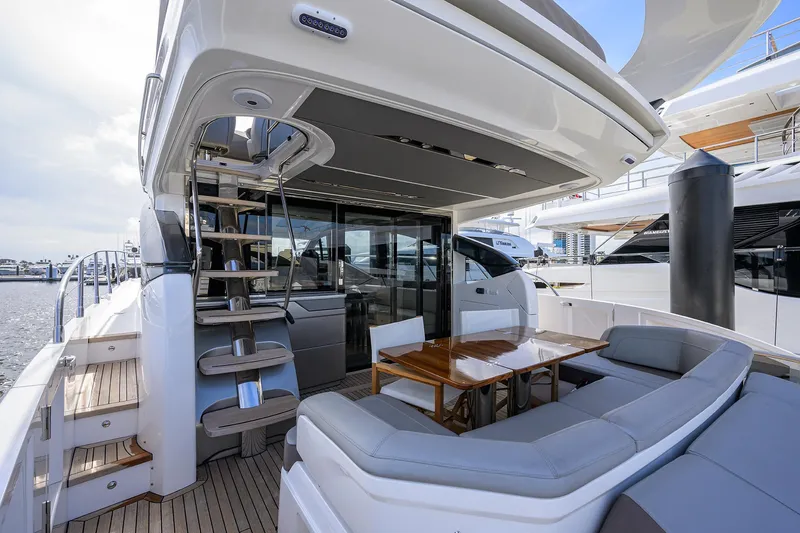 Rockon Yacht Photos Pics Princess S60 RockOn - Aft Deck, Stairs to Bridge, Seating and Table