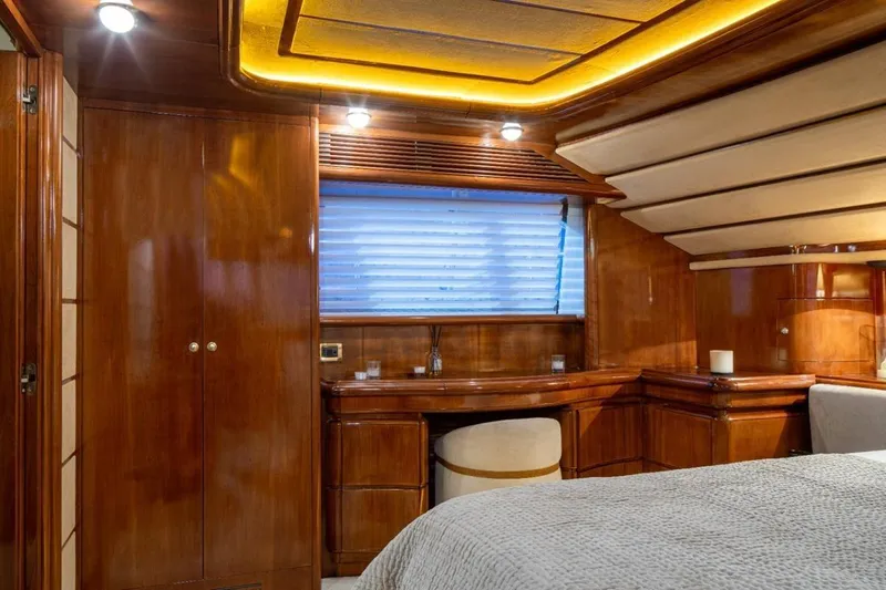  Yacht Photos Pics Luxurious wooden interior of 1999 Ferretti Customline 94 yacht cabin.