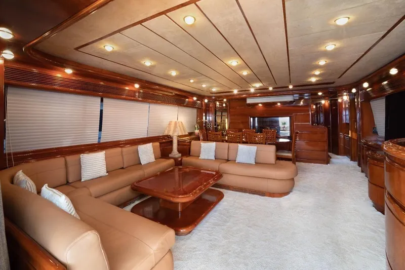  Yacht Photos Pics Luxurious interior of 1999 Ferretti Yachts CUSTOMLINE 94 with elegant seating and wooden accents.