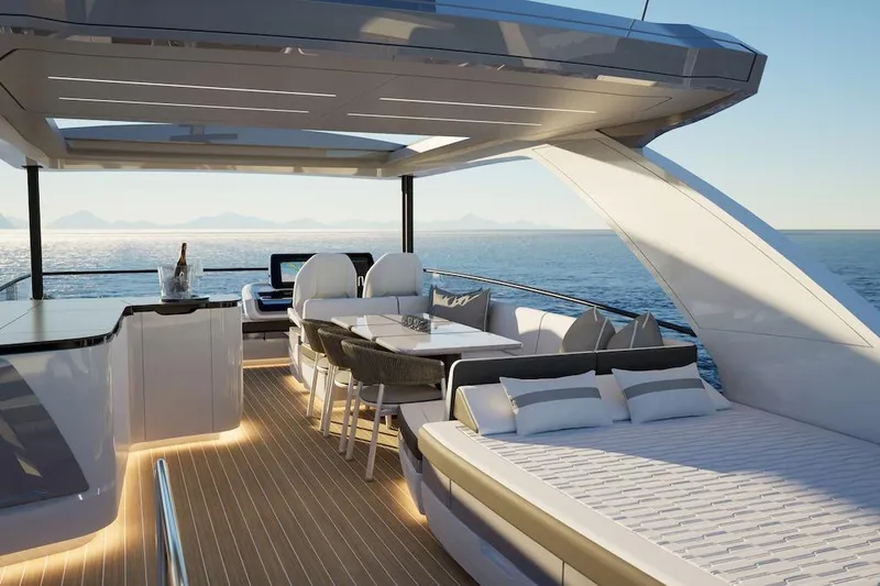 Yacht Photos Pics Luxurious Pearl 73 yacht deck with seating, table, and ocean view, 2027 model.
