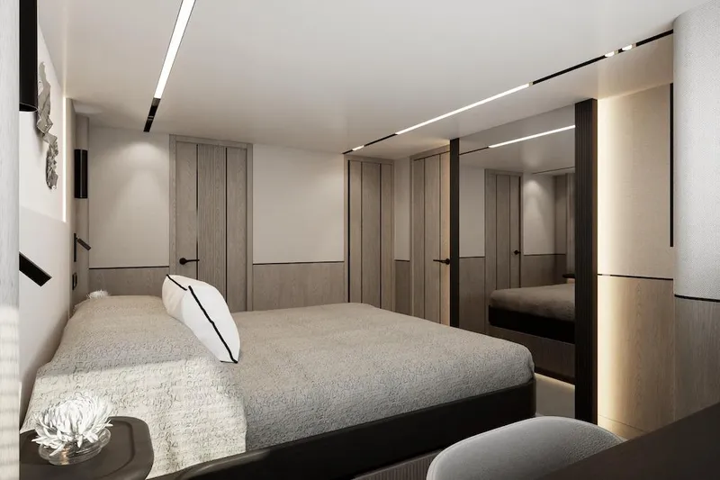  Yacht Photos Pics Modern bedroom interior in Pearl 73 yacht, 2027 model, featuring sleek design and ambient lighting.