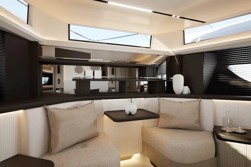  Yacht Photos Pics Luxurious interior of 2027 Pearl 73 yacht with modern seating and elegant decor.
