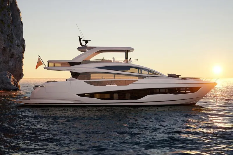  Yacht Photos Pics Luxurious Pearl 73 yacht cruising at sunset, 2027 model, near rocky coastline.