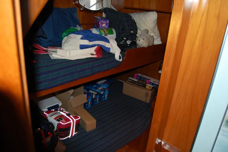 Sumptin Special Yacht Photos Pics Cozy cabin with bunk beds in 1990 Ocean Alexander 520 Pilothouse yacht.