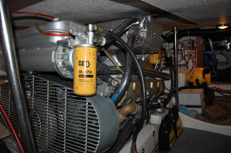Sumptin Special Yacht Photos Pics Engine room of 1990 Ocean Alexander 520 Pilothouse with CAT fuel filter.