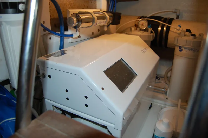 Sumptin Special Yacht Photos Pics Engine room of 1990 Ocean Alexander 520 Pilothouse with water filtration system.