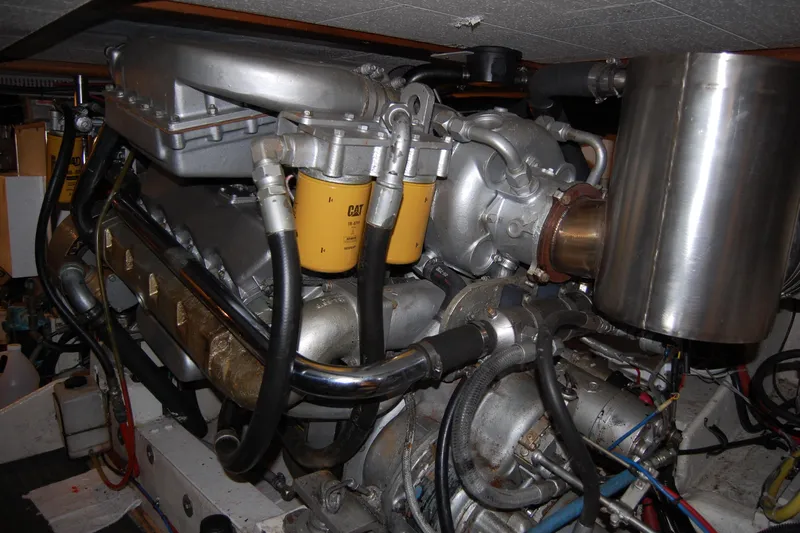 Sumptin Special Yacht Photos Pics Engine room of 1990 Ocean Alexander 520 Pilothouse yacht, featuring CAT components.