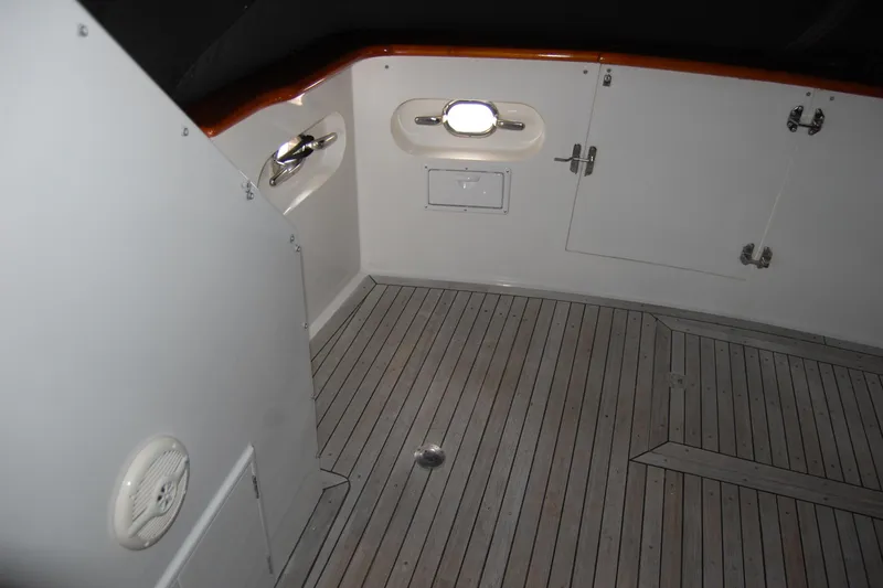 Sumptin Special Yacht Photos Pics 1990 Ocean Alexander 520 Pilothouse interior with wooden flooring and white paneling.