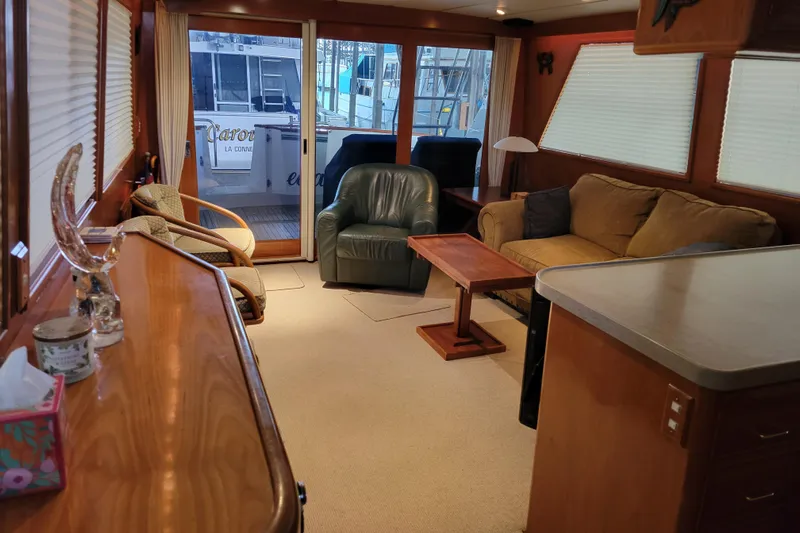 Sumptin Special Yacht Photos Pics Luxurious interior of 1990 Ocean Alexander 520 Pilothouse yacht with cozy seating area.