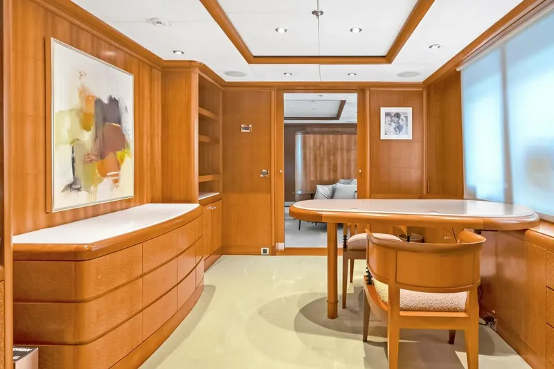 Unforgettable Yacht Photos Pics Luxurious interior of 2003 Royal Denship M.Y. yacht with elegant wood furnishings and modern decor.
