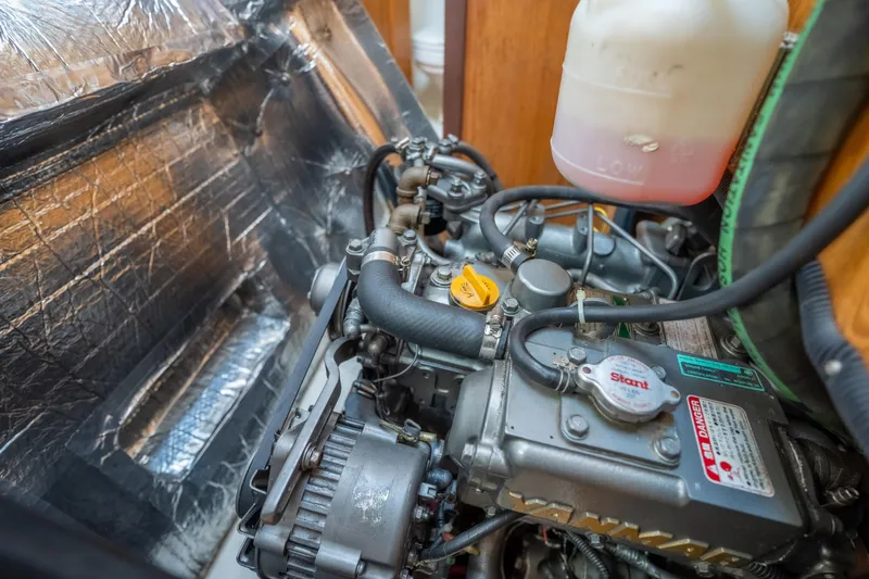 Aries Yacht Photos Pics Engine compartment of a 2002 Catalina 380 sailboat, showing detailed components and insulation.