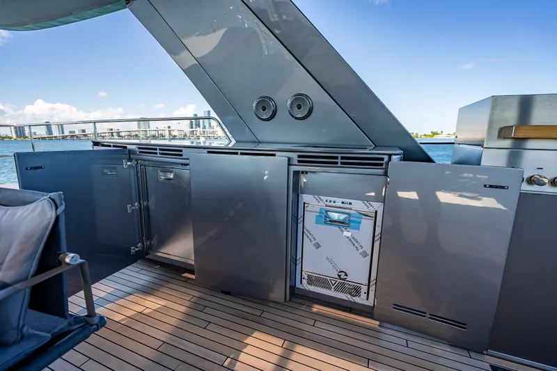 Skip The Wait - Trade Ins Considered Yacht Photos Pics Outdoor kitchen on 2026 Sunreef 60 Power yacht with sleek cabinetry and ocean view.