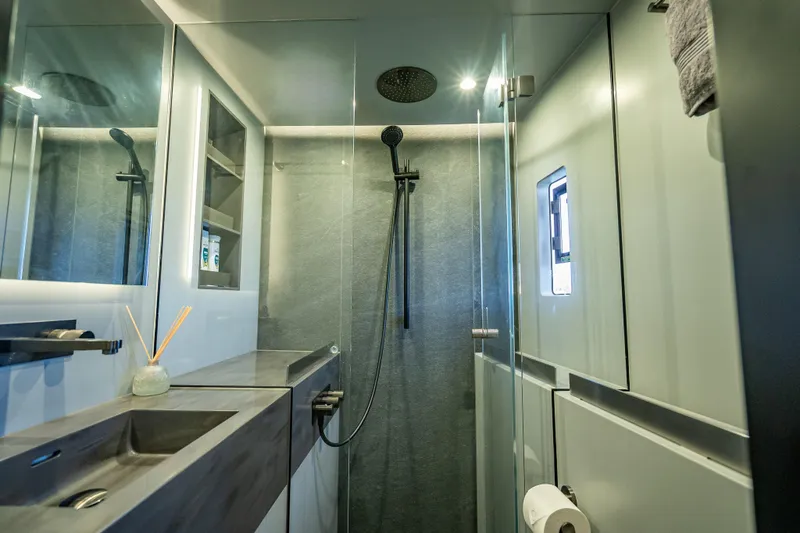 Skip The Wait - Trade Ins Considered Yacht Photos Pics Luxurious bathroom in 2026 Sunreef 60 Power yacht, featuring modern shower and sleek design.