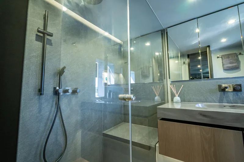 Skip The Wait - Trade Ins Considered Yacht Photos Pics Luxurious bathroom in 2026 Sunreef 60 Power yacht with modern shower and sleek design.