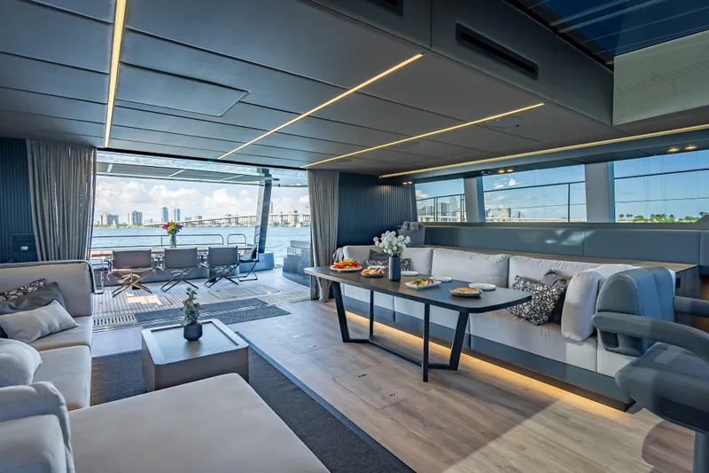 Skip The Wait - Trade Ins Considered Yacht Photos Pics Luxurious interior of 2026 Sunreef 60 Power yacht with elegant seating and ocean view.