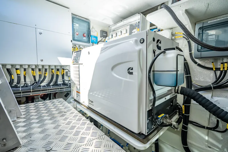 Skip The Wait - Trade Ins Considered Yacht Photos Pics Engine room of 2026 Sunreef 60 Power yacht with Cummins generator and wiring.
