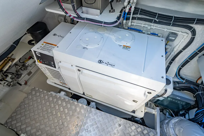 Skip The Wait - Trade Ins Considered Yacht Photos Pics Engine room of 2026 Sunreef 60 Power yacht with generator and wiring.