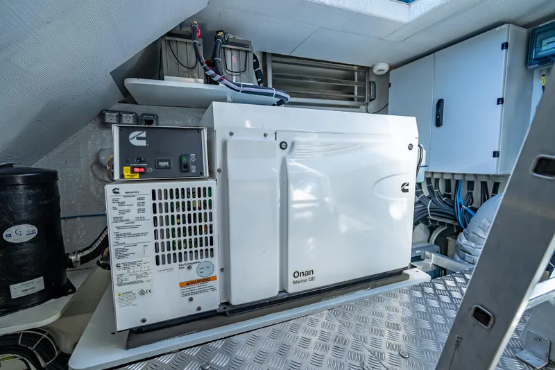 Skip The Wait - Trade Ins Considered Yacht Photos Pics Engine room of 2026 Sunreef 60 Power yacht with Cummins Onan generator.