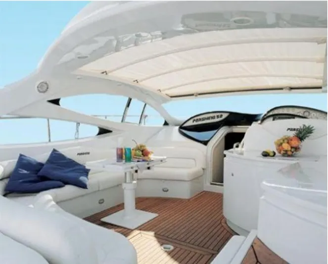 Mira Yacht Photos Pics Luxurious 2002 Pershing 52' yacht interior with elegant seating and fruit display.