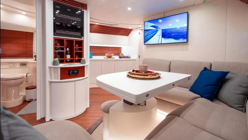 Mira Yacht Photos Pics Luxurious interior of 2002 Pershing 52' yacht with modern amenities and elegant design.