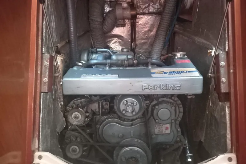  Yacht Photos Pics Perkins engine in a 1996 Beneteau 50 sailboat, showcasing mechanical components.