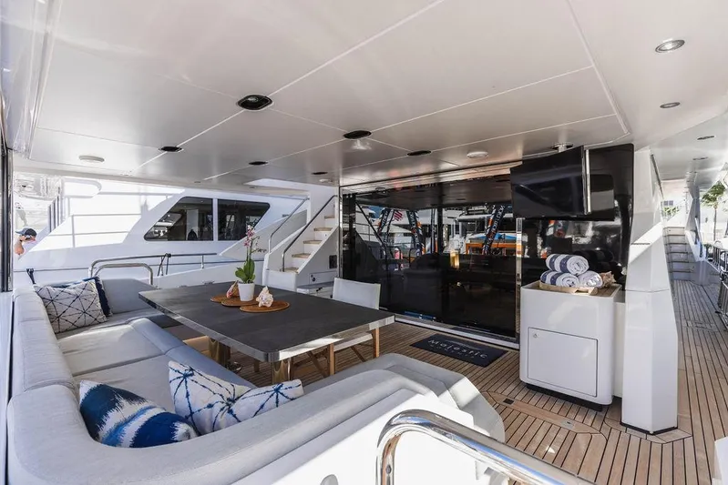 Majestic Moments Yacht Photos Pics Luxurious 2019 Azimut Grande 27 METRI yacht interior with elegant seating and dining area.