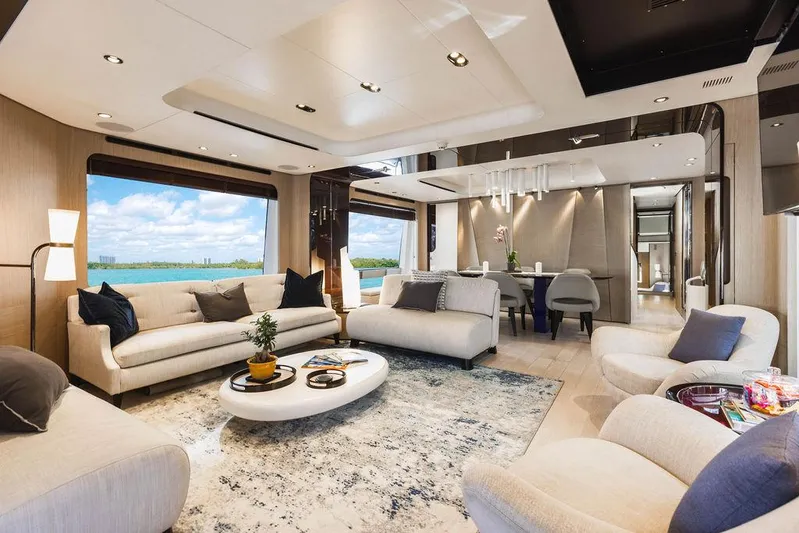 Majestic Moments Yacht Photos Pics Luxurious interior of 2019 Azimut Grande 27 METRI yacht with elegant furnishings and ocean view.