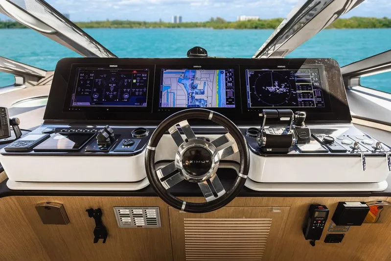 Majestic Moments Yacht Photos Pics Cockpit of 2019 Azimut Grande 27 METRI yacht with advanced navigation systems.
