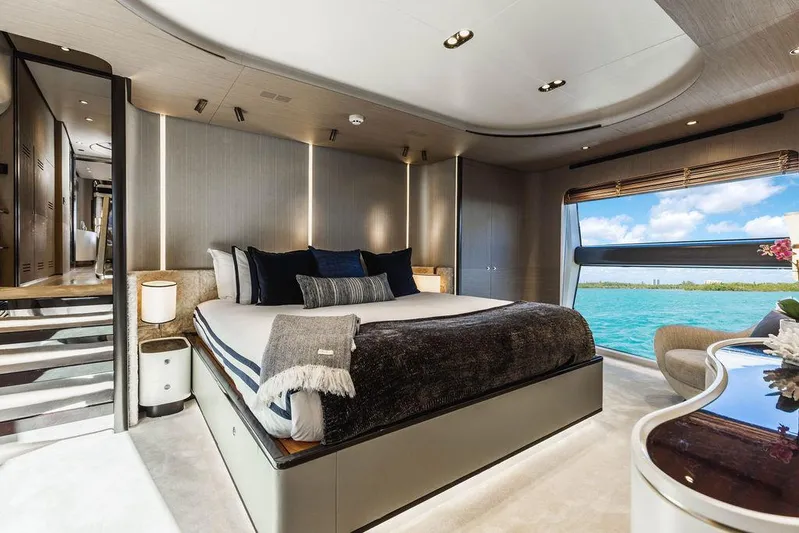 Majestic Moments Yacht Photos Pics Luxurious bedroom interior of 2019 Azimut Grande 27 METRI yacht with ocean view.