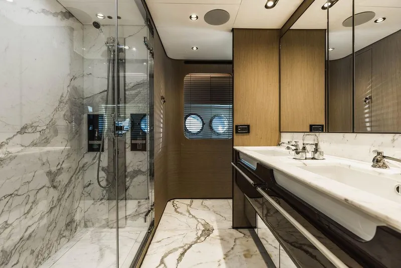 Majestic Moments Yacht Photos Pics Luxurious bathroom in 2019 Azimut Grande 27 METRI yacht with marble and modern fixtures.