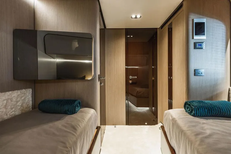 Majestic Moments Yacht Photos Pics Luxurious interior of 2019 Azimut Grande 27 METRI yacht with twin beds and modern decor.