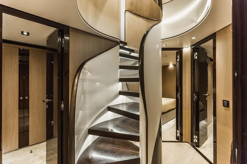 Majestic Moments Yacht Photos Pics Luxurious interior of 2019 Azimut Grande 27 METRI yacht with elegant spiral staircase.