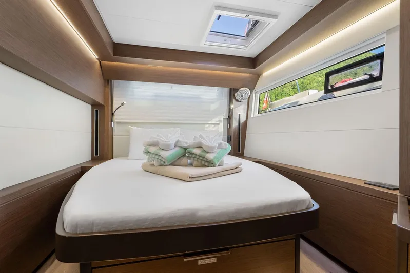 Echo Yacht Photos Pics Luxurious cabin interior of 2023 Lagoon 50 yacht with modern design and natural light.