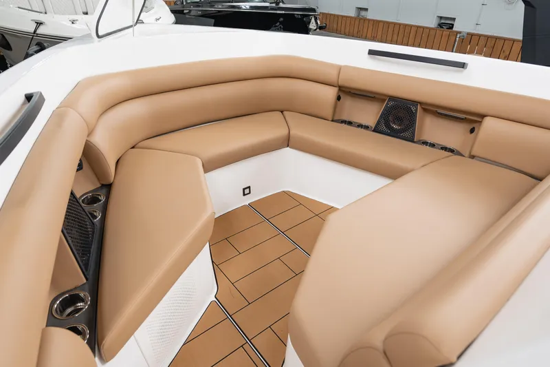  Yacht Photos Pics Luxurious seating area on 2024 Aviara AV40 I/O boat with tan upholstery and cup holders.