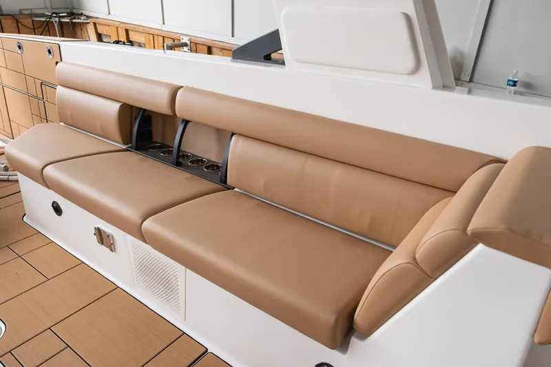  Yacht Photos Pics 2024 Aviara AV40 I/O boat interior with tan leather seating and cup holders.