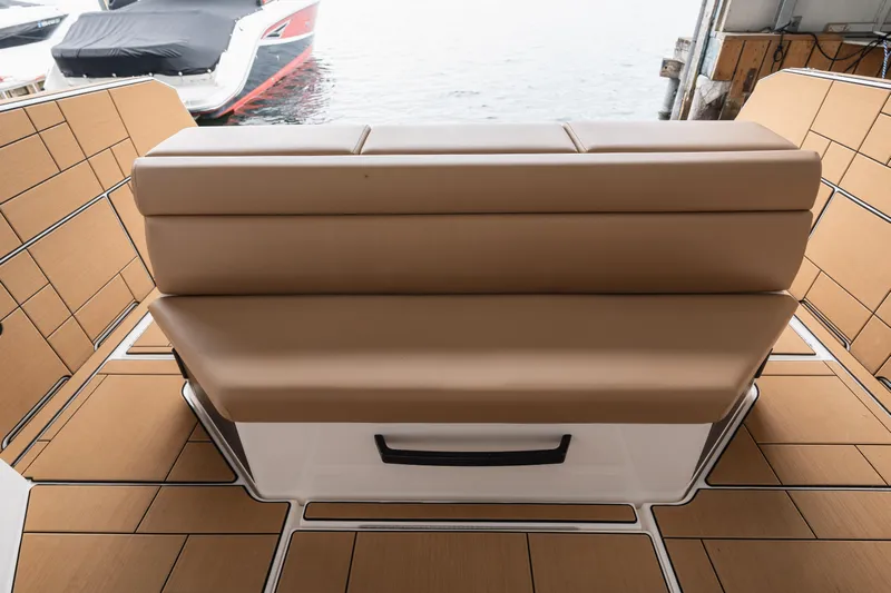  Yacht Photos Pics 2024 Aviara AV40 I/O boat interior with tan seating and wood-patterned flooring.