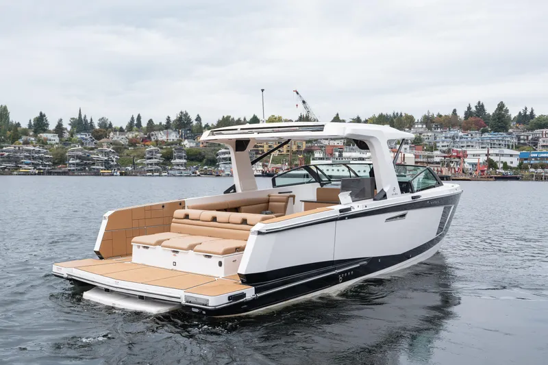  Yacht Photos Pics 2024 Aviara AV40 I/O luxury boat on a scenic lake with modern design.
