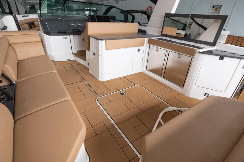  Yacht Photos Pics 2024 Aviara AV40 I/O boat interior with tan seating and modern amenities.