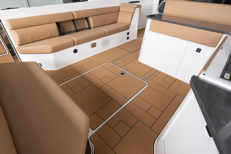  Yacht Photos Pics 2024 Aviara AV40 I/O interior with tan seating and sleek flooring design.