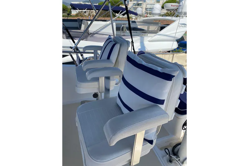  Yacht Photos Pics White and blue striped cushions on Selene 47 yacht seats, 2005 model.