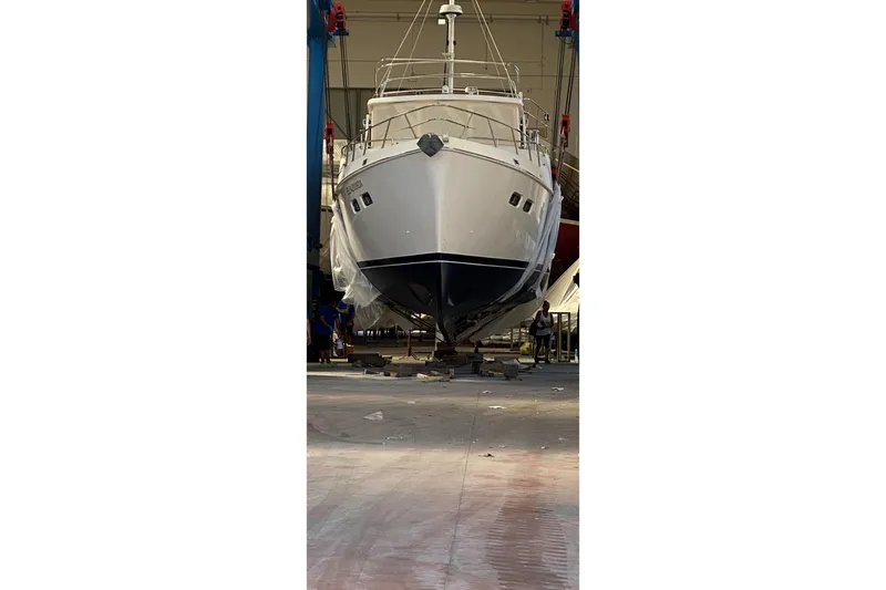  Yacht Photos Pics Selene 47 yacht from 2005 in a shipyard, undergoing maintenance.