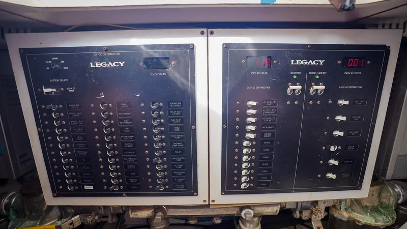 Gyspy Baby Yacht Photos Pics Legacy 32 electrical control panels, 2007 model, featuring switches and indicators.
