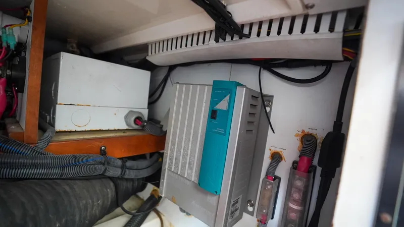 Gyspy Baby Yacht Photos Pics Electrical components inside a 2007 Legacy 32 boat, featuring wiring and control boxes.