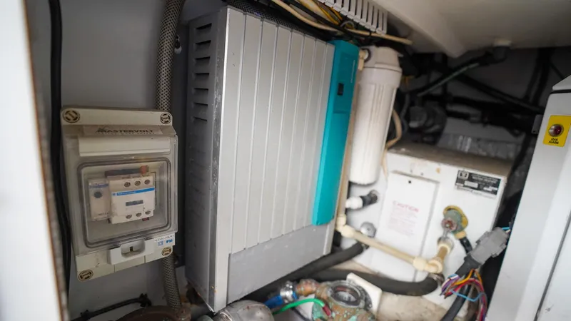 Gyspy Baby Yacht Photos Pics Electrical components inside a 2007 Legacy 32 boat engine compartment.