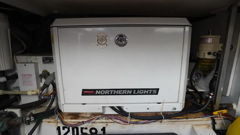 Gyspy Baby Yacht Photos Pics Northern Lights generator in a 2007 Legacy 32 boat engine compartment.