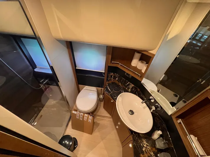  Yacht Photos Pics Luxurious bathroom in 2018 Absolute 52 Navetta yacht with modern fixtures and elegant design.
