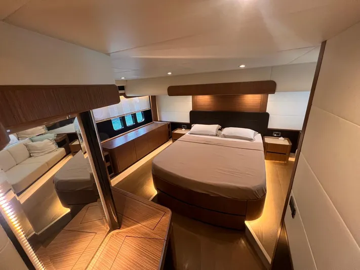  Yacht Photos Pics Luxurious bedroom interior of 2018 Absolute 52 Navetta yacht with modern design elements.