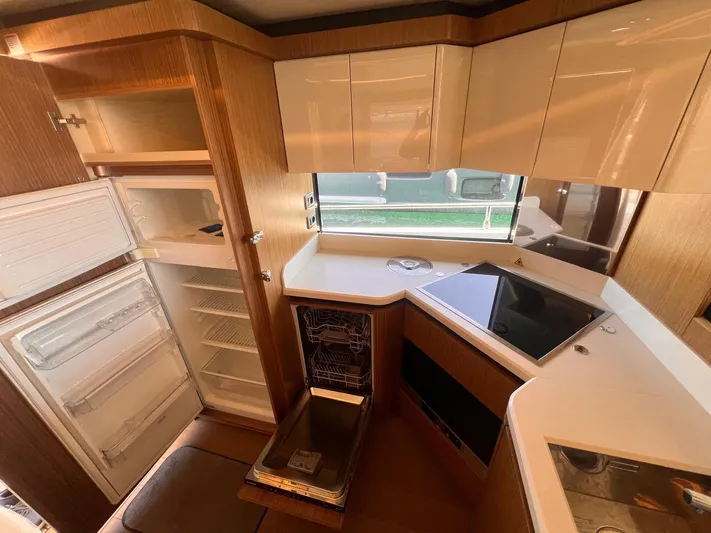  Yacht Photos Pics Modern kitchen in 2018 Absolute 52 Navetta yacht with open fridge and dishwasher.